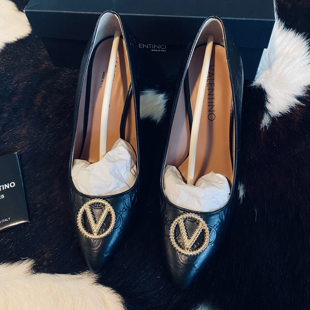 Brand NEW beautiful black Valentino heels. Size 8 purchased from Saks Fifth Ave